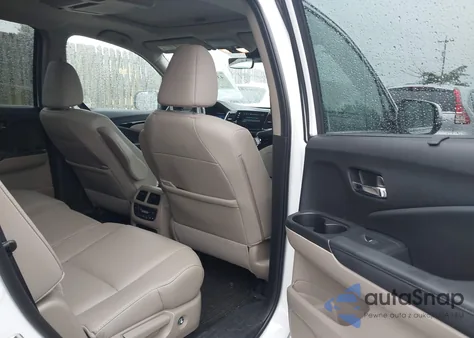 2021 Honda Pilot Touring from USA, damaged, VIN 5FNYF6H93MB026803